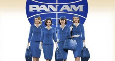 Trim blue-suited Pan Am stewardesses