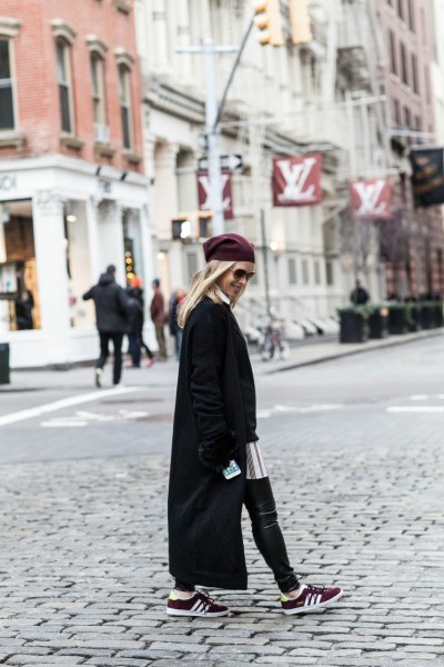 black sweater and beanie